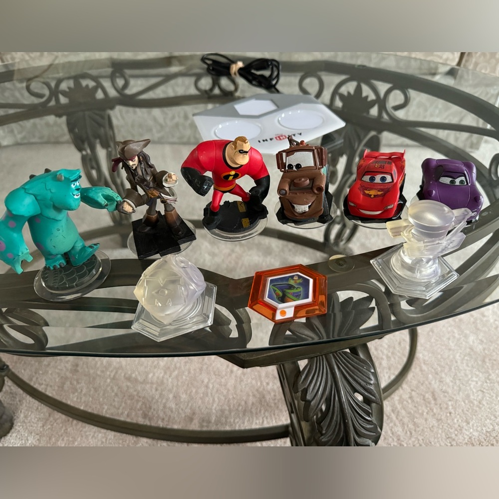 Disney Infinity Characters and Portal Base Pad
